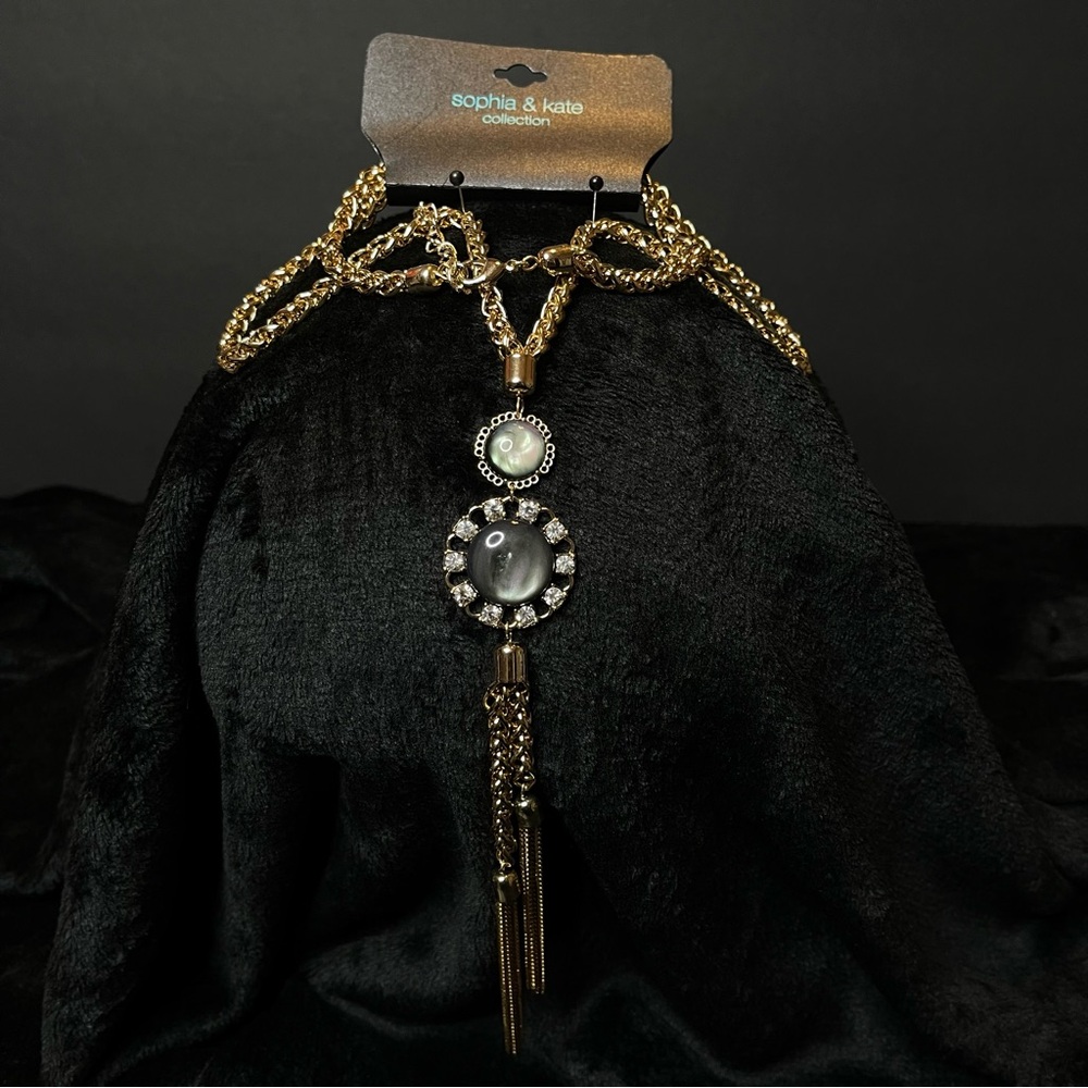 Long Gold Necklace with Black and Silver Accents